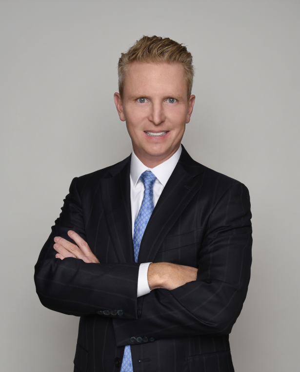 Professional headshot of John Lie-Nielsen, Founder & CEO